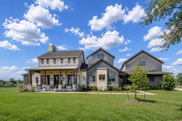 4803 Riverbend Court, Fulshear, TX — riverfront estate exterior