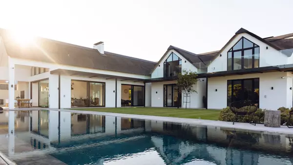 view-of-luxurious-modern-house-exterior-with-garde-2025-04-04-05-49-46-utc hero