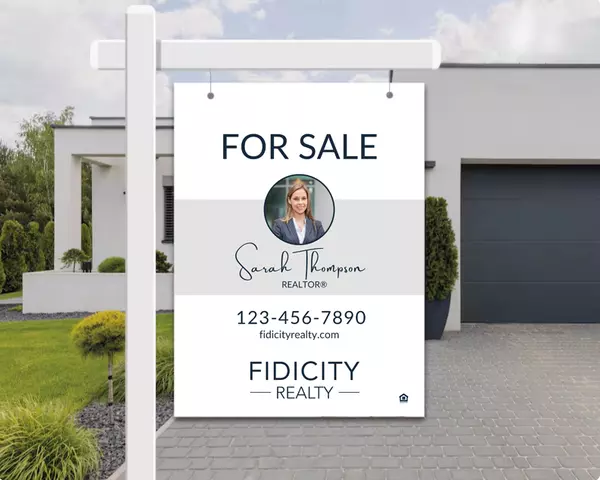 For Sale sign in front of home
