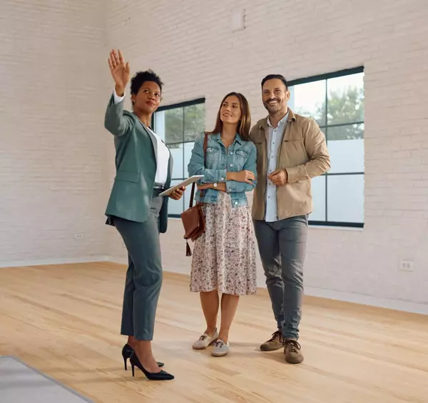 black-real-estate-agent-showing-property-to-her-cl-2024-12-13-22-29-55-utc