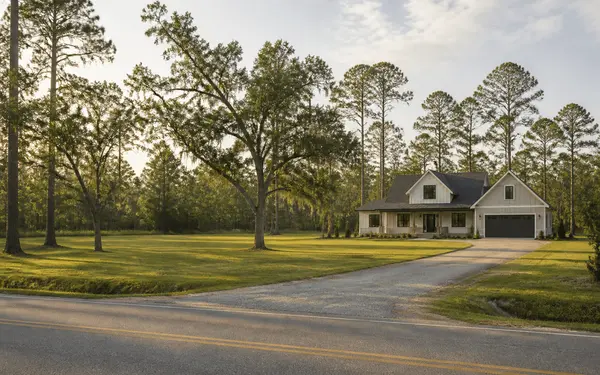 Newly built single-family home on a large wooded lot in rural Nassau County, Florida