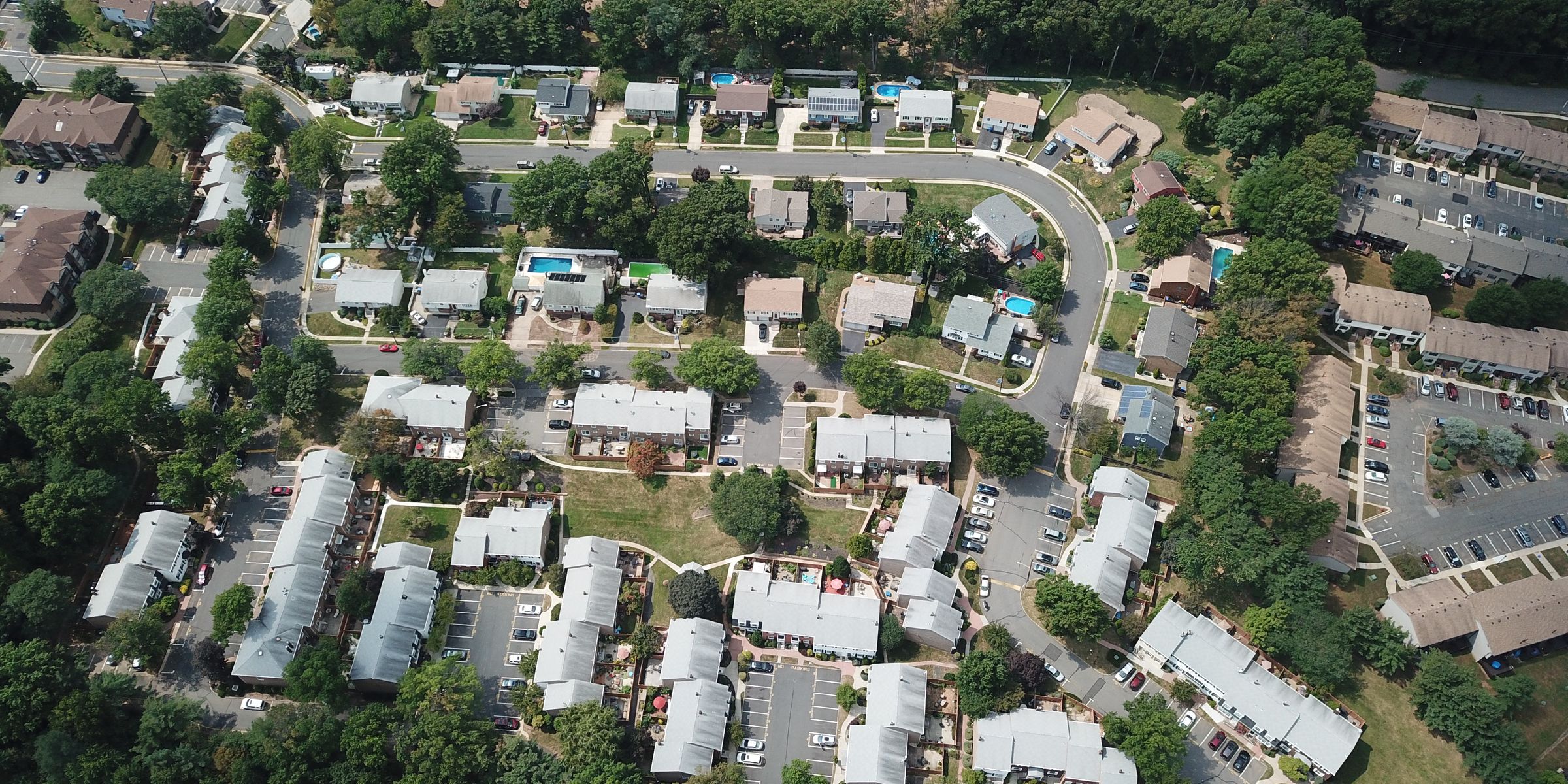 Aerial view of a tree-lined New Jersey neighborhood