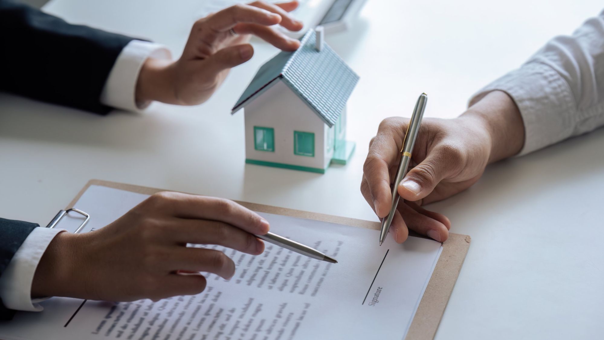 Agent assisting a buyer with a contract - Ted Moseley, Realtor