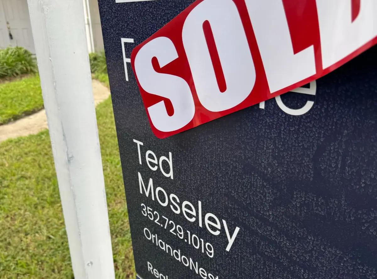 1142 Kerwood Circle for sale sign with sold banner over the top