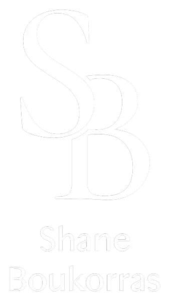 ShaneBoukorras_rgb_Logo_Vert_White