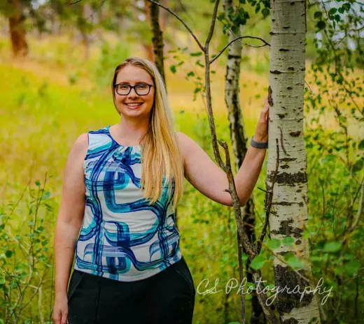 Professional Photo of Lindsay Shoemaker with a blue and white shirt