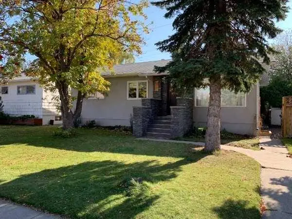 719 49 AVE SW, Calgary, AB T2G 1G7