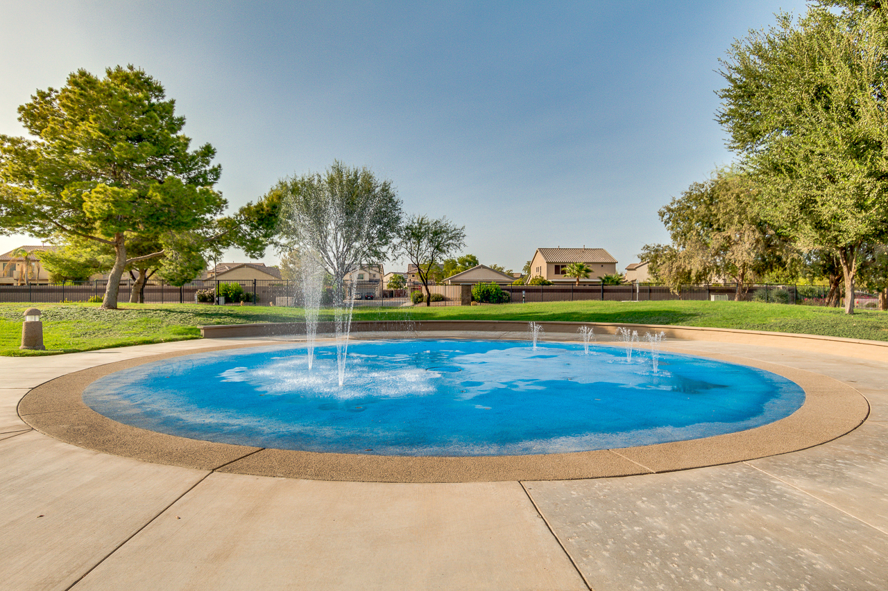Neighborhood park and lake amenities in The Villages at Rancho El Dorado, Maricopa AZ