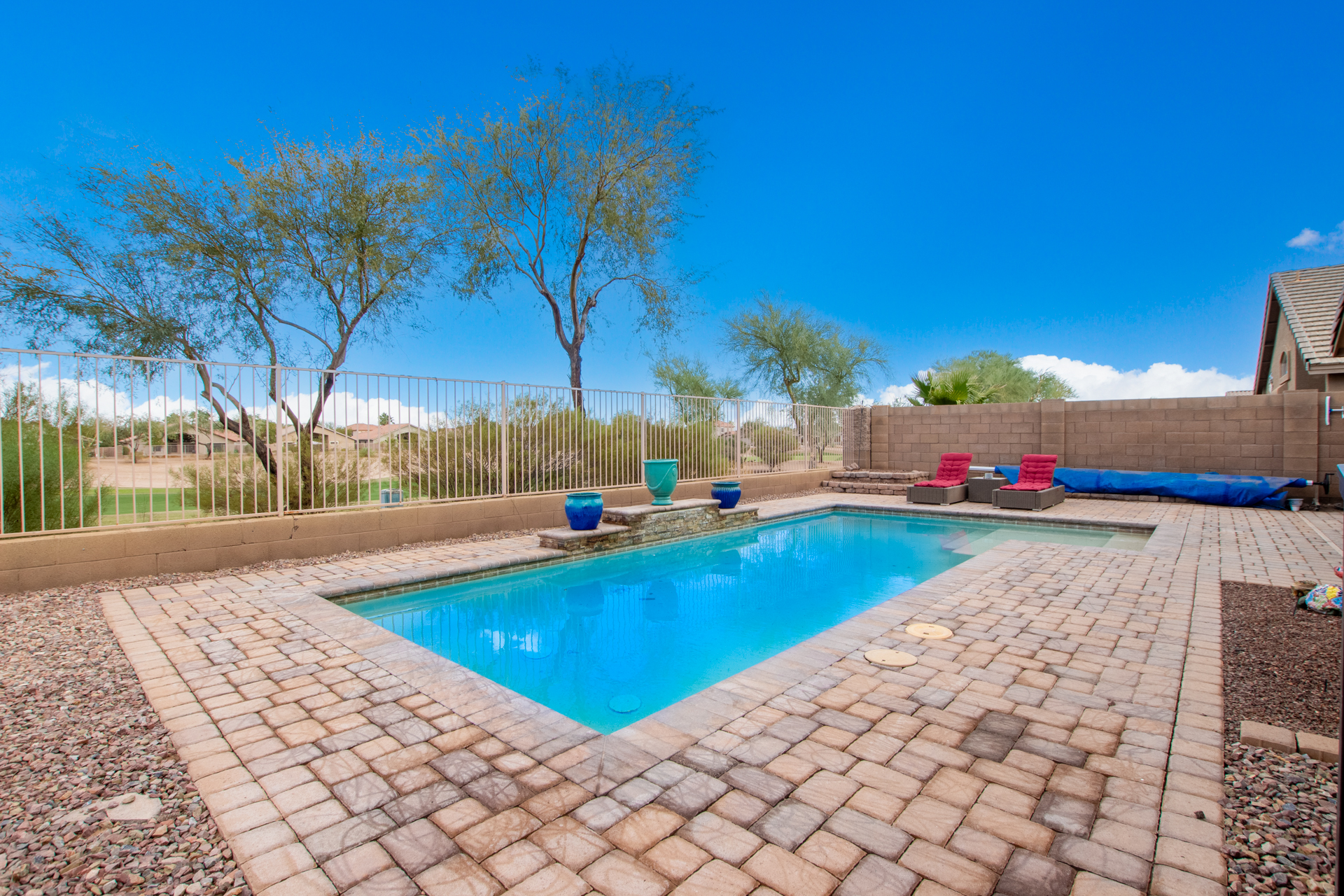 Homes along The Duke golf course and lake in Rancho El Dorado, Maricopa AZ