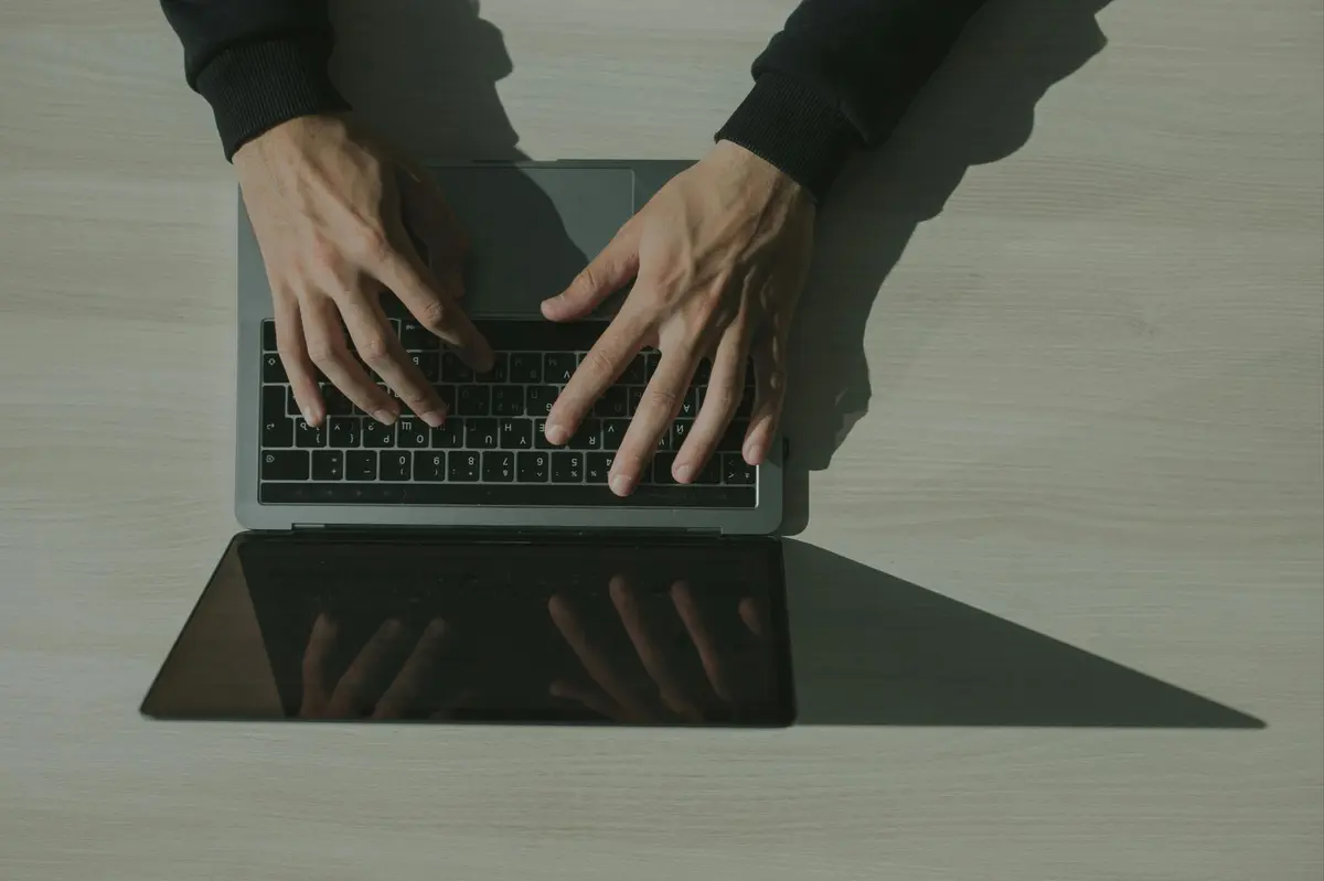 real estate agent using laptop