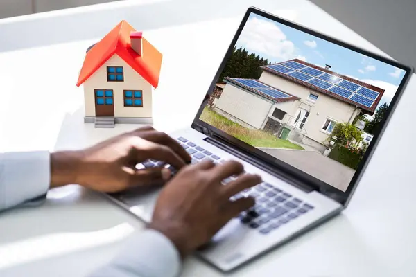 Looking-Real-Estate-Home-Or-House-On-Laptop-Computer-1