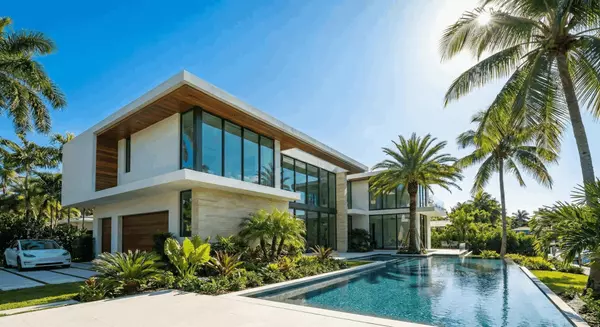 Modern home for sale in Miami neighborhood with palm trees and contemporary design