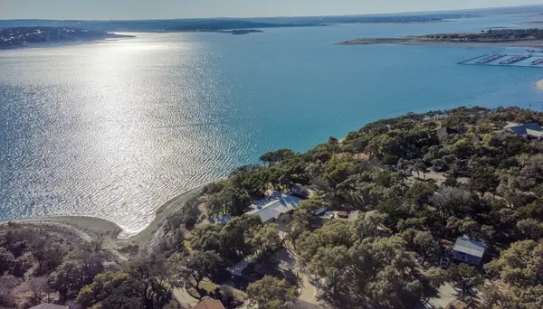 Scenic view of boats and blue water at Canyon Lake in the Texas Hill Country.
