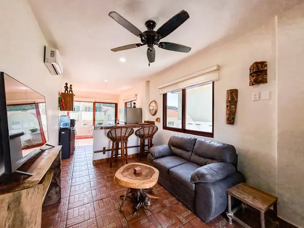 Bright & Breezy Top-Floor Beach Condo