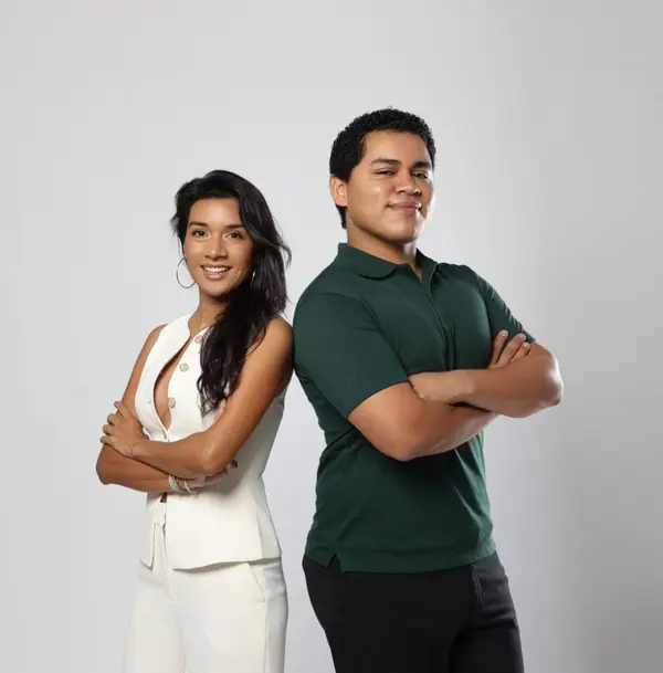 Rita and Giovanni back to back smiling