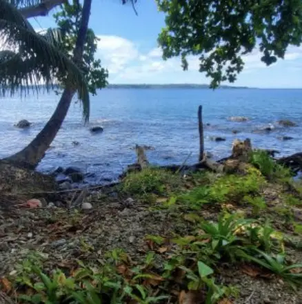 Titled Oceanfront Acreage