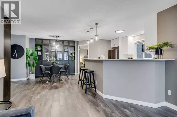 8128, 304 Mackenzie Way SW, Airdrie, AB T4B3H8