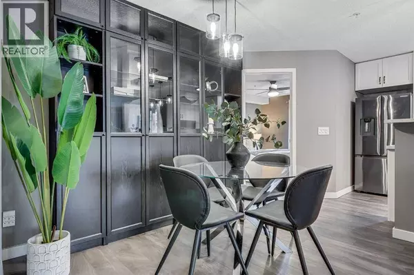 8128, 304 Mackenzie Way SW, Airdrie, AB T4B3H8