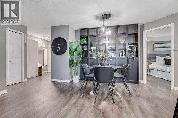 8128, 304 Mackenzie Way SW, Airdrie, AB T4B3H8