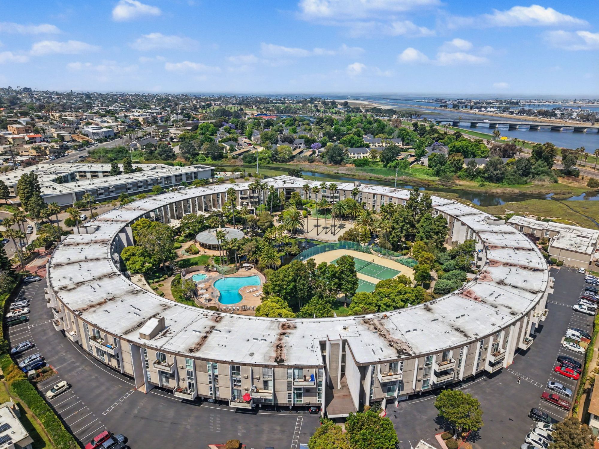Pacific Isle condo community grounds with pool and lily ponds in Point Loma San Diego