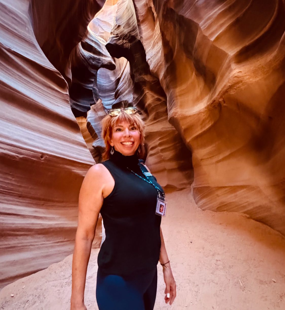 Shaaron hiking in a slot canyon