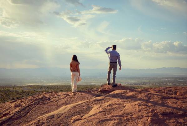 Hikers enjoying panoramic Las Vegas Strip views near Astra at La Madre Peaks