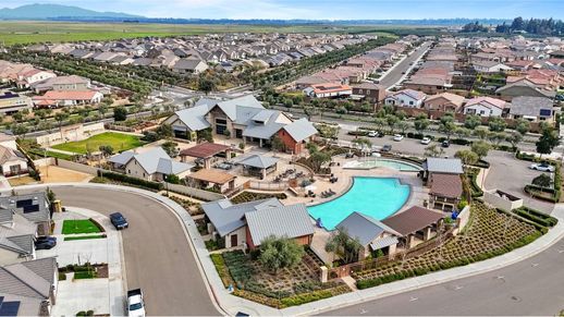 Aerial view of Riverstone showing the scale of residential development with multiple neighborhoods, various home styles, and the diversity of the 6,578 planned residences