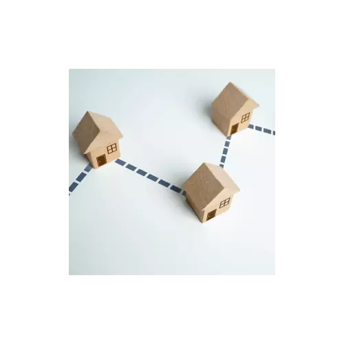 Two wooden blocks connected by string, symbolizing collaboration and getting started in the home buying process.