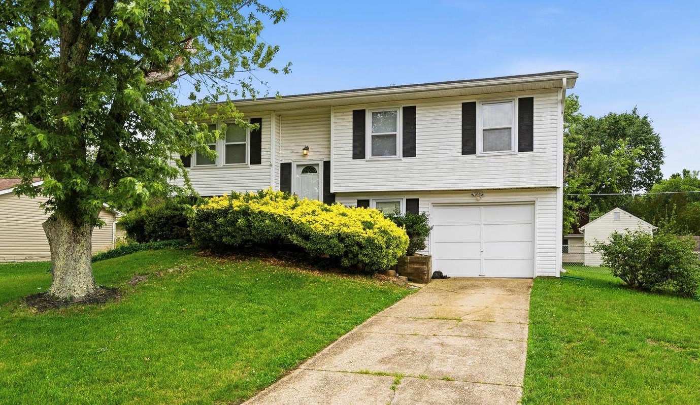 Frame split-level home with a one-car attached garage in Waldorf, MD