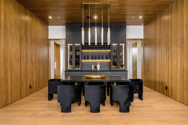 contemporary-dining-room-with-black-chairs-and-woo-2025-02-10-06-40-48-utc