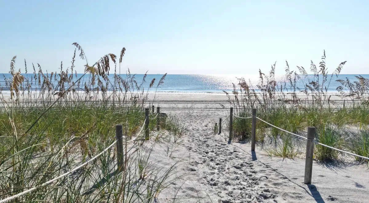 Sandy beach, coastal dunes and Atlantic Ocean in Atlantic Beach, Florida.