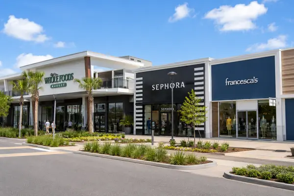 Modern shopping center in Mandarin, Jacksonville, Florida, featuring national retailers, specialty shops, restaurants, landscaped walkways, and convenient everyday shopping.