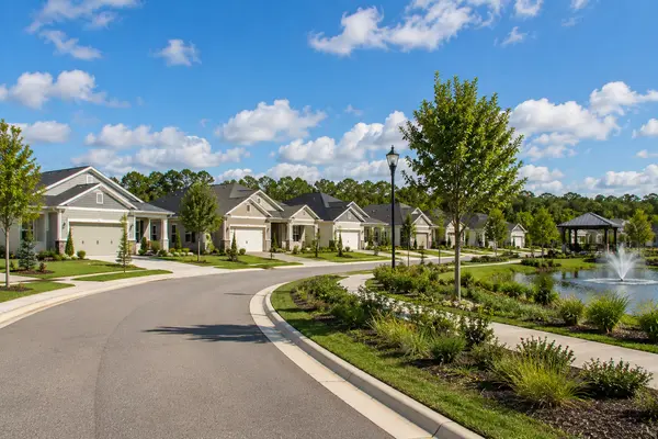 New construction homes in eTown, a master-planned Jacksonville community featuring modern residences, landscaped streets, walking paths, and resort-style amenities.