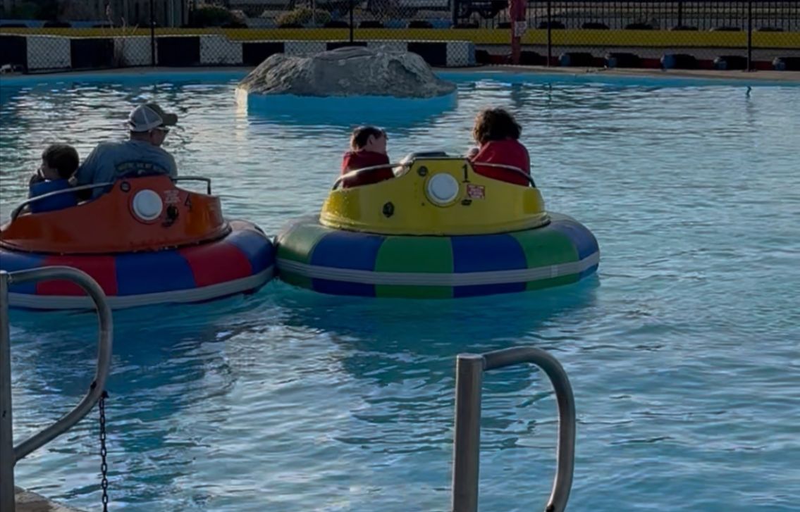 Family enjoying bumper boats at Race City in Panama City Beach Florida