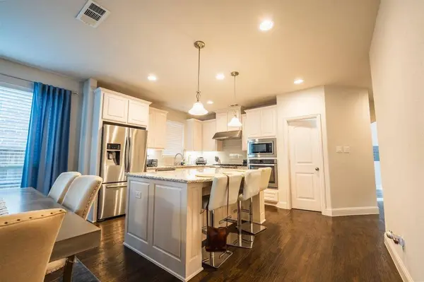 Open view of kitchen at 408 Highwood Trail Lewisville