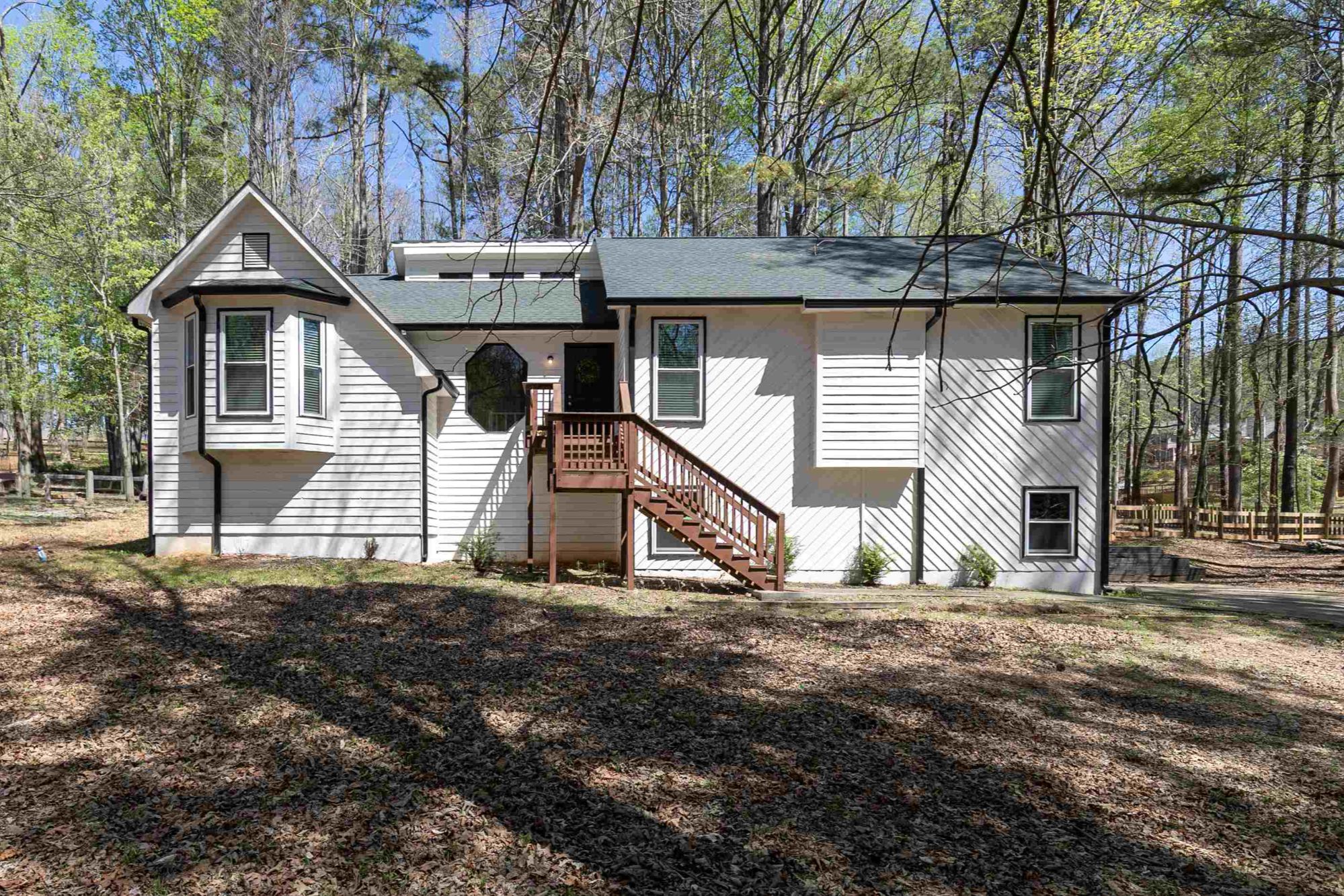 Raised ranch home on 1-acre wooded lot in Allatoona Shores Woodstock GA