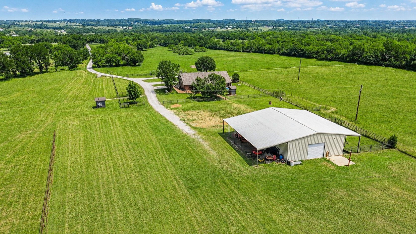 A 4-bedroom brick homestead on acreage at the end of a private dead-end road in Grayson County.