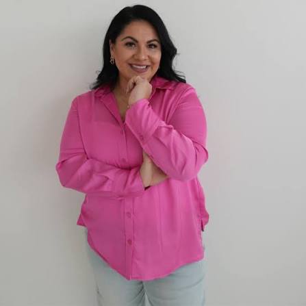Brenda Rice, The NoCo Realtor, wearing a hot pink shirt