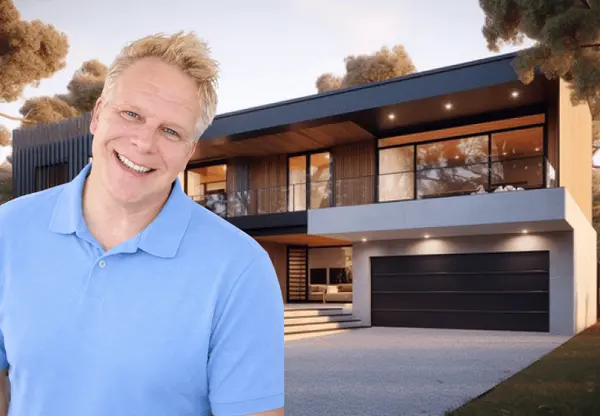 robbie in front of home
