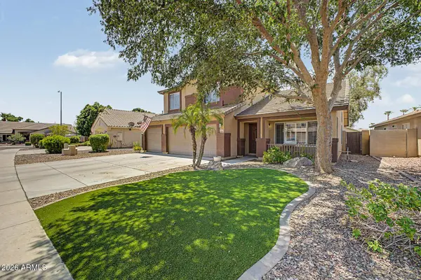 8227 W HARMONY Lane