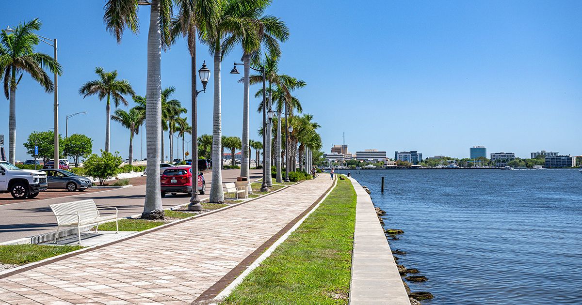 Palm-lined waterfront promenade along the Manatee River in Palmetto Florida Manatee County