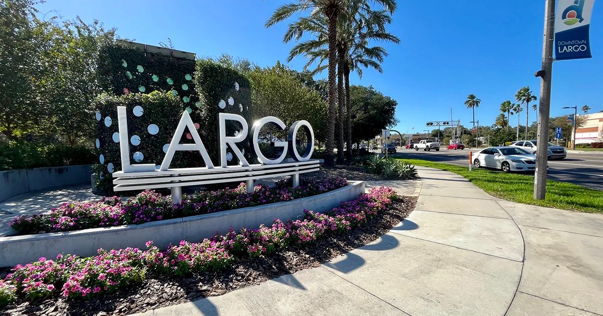 Downtown Largo Florida welcome sign with palm trees and flowers in Pinellas County