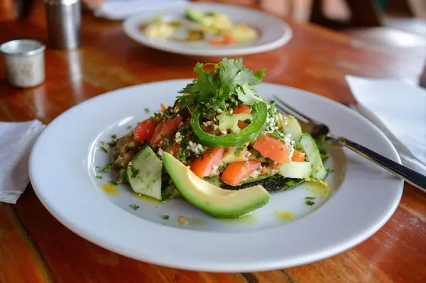 fresh-vegetable-salad-garnished-with-herbs-and-top-2026-01-08-07-28-15-utc