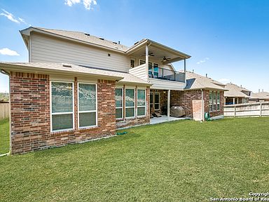 Green backyard lawn after listing preparation, highlighting the impact of intentional curb appeal before selling a home.