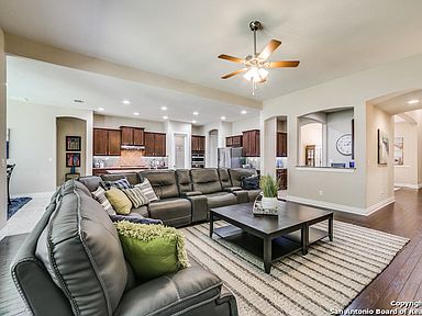Thoughtfully staged living room showing how small design choices help a home feel inviting to buyers.