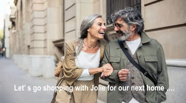 W- older couple smiling walking down 8k copy