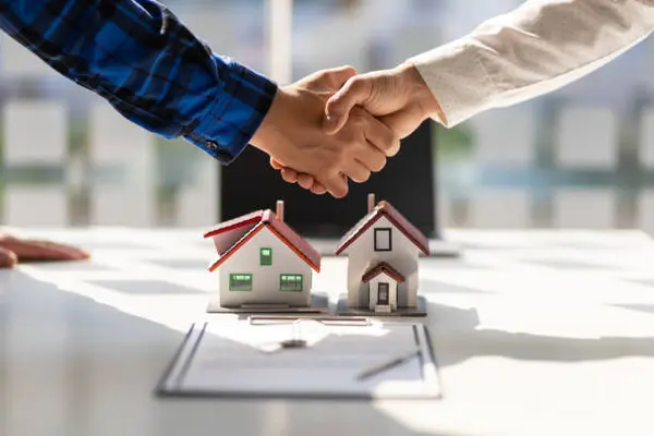 Shaking of hands after real estate transaction baltimore maryland real estate
