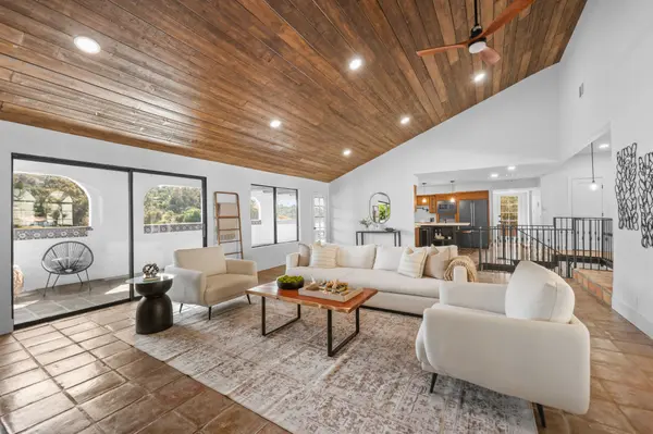Luxury hillside home in La Habra Heights. Living area of a Spanish-style home with plenty of natural light.