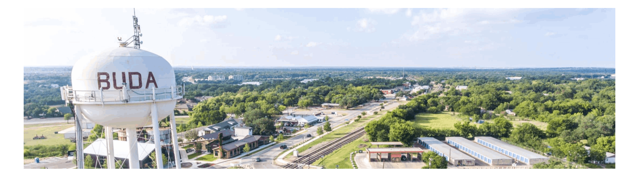 Downtown Buda, Texas featuring historic buildings and a small‑town Central Texas streetscape