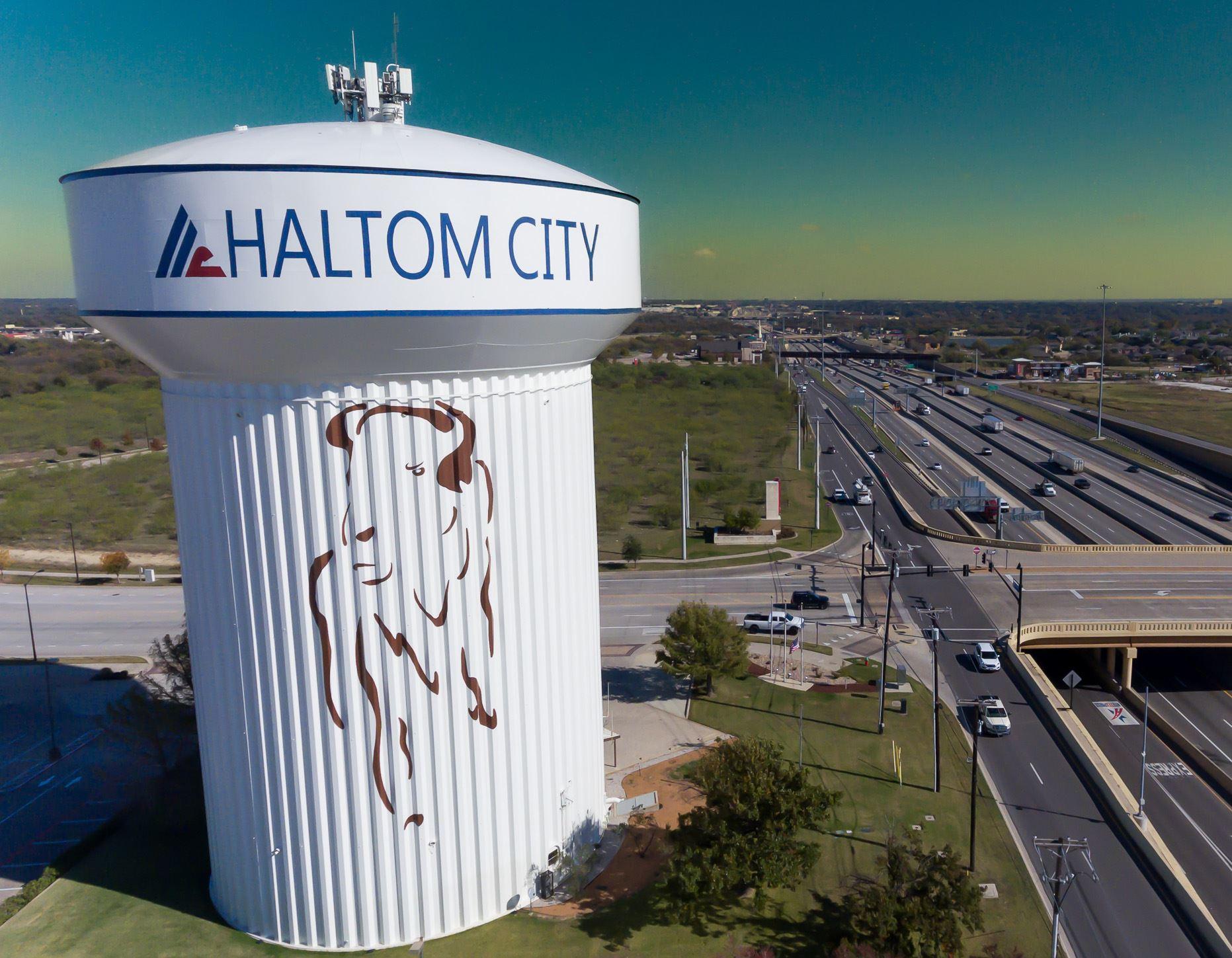 Iconic Haltom City, Texas water tower and entrance monument welcoming residents to this established Fort Worth suburb.
